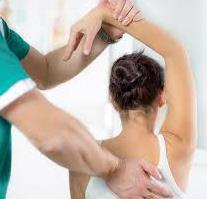 Chiropractor treating woman