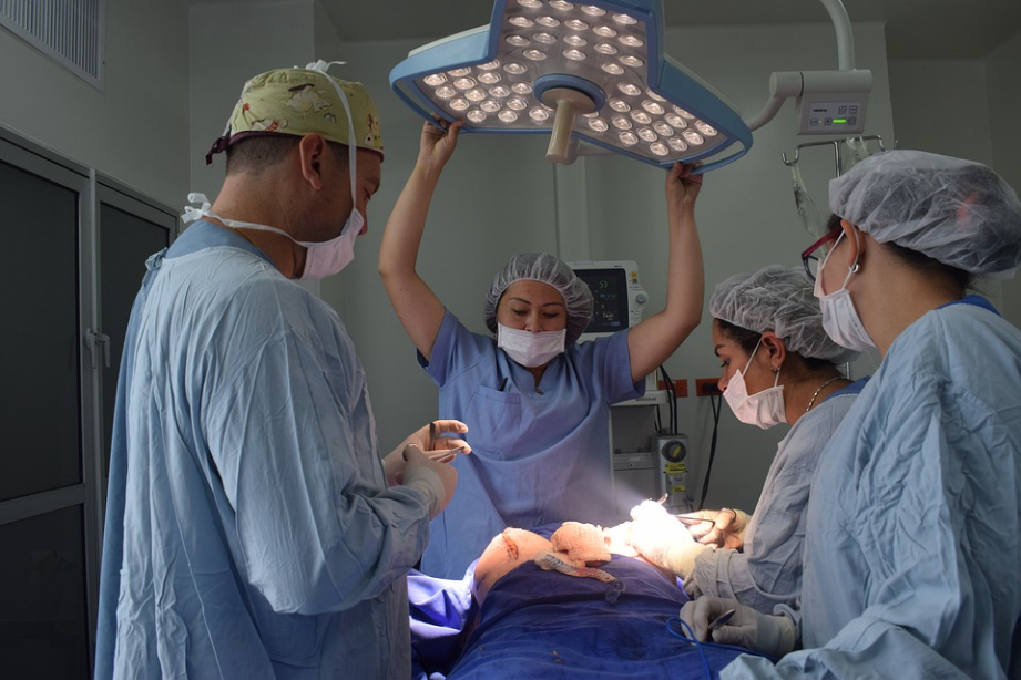 a group of surgeons during an operation
